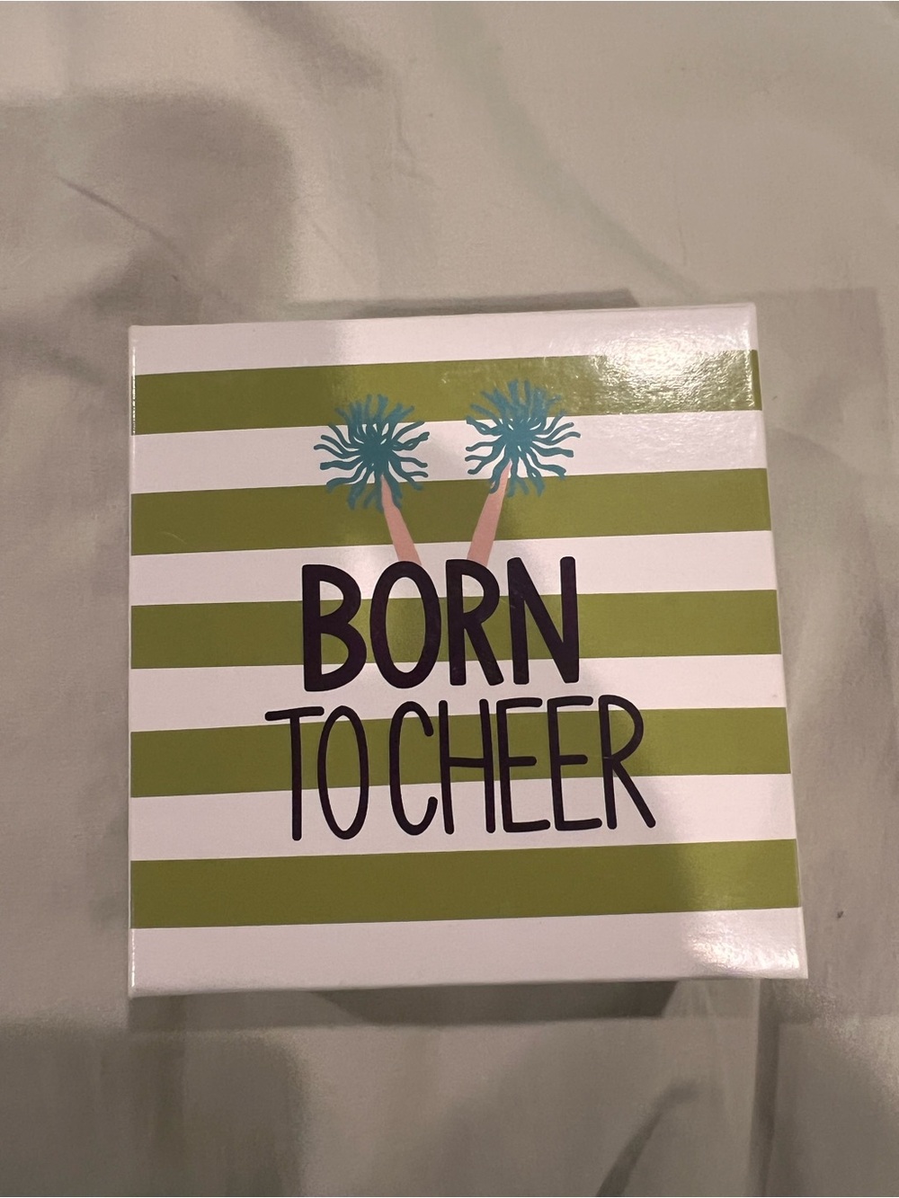 Cotton Colors Green,  'Born to Cheer' glass ornament with box and tag